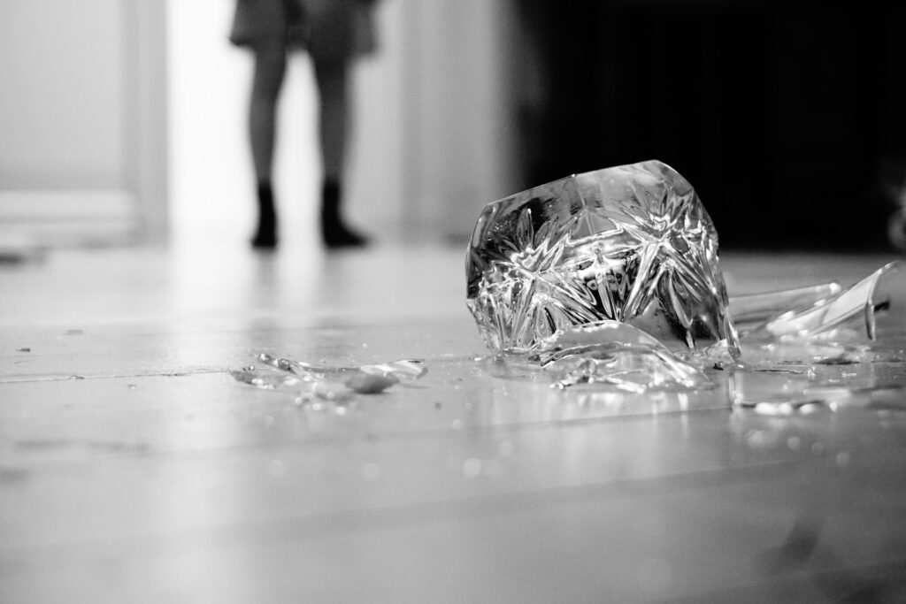 a broken glass on the floor